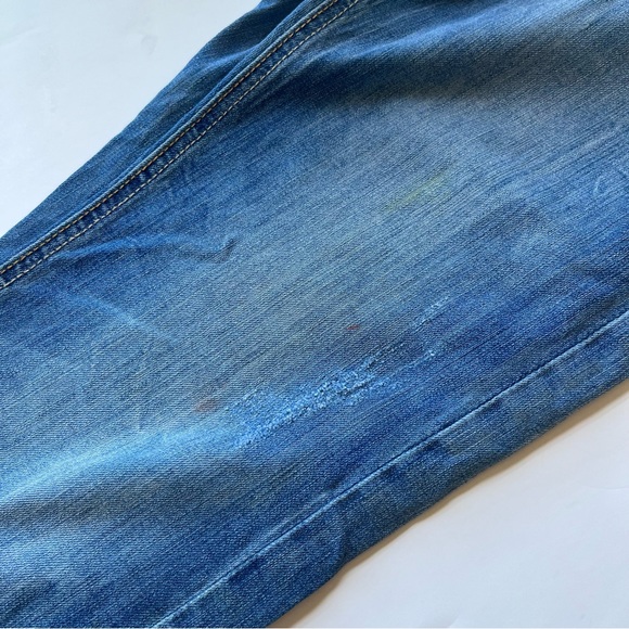 Mid Rise Tapered Distressed Slim Jeans - Picture 6 of 7